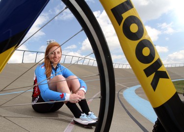 Allison Beveridge, from Calgary, leaves for Pan Am Games in Toronto as she readies herself to race in the Team Pursuit in July, in Calgary, on June 11, 2015. Allison poses in Calgary's Velodrome.  (Christina Ryan/Calgary Herald)