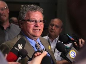 Calgary city councillor Shane Keating spoke outside the council chambers on June 29, 2015.