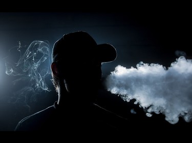 Jason Kim, owner of the Vape Depot, poses in his shop along 32nd Avenue northwest in Calgary on Monday, June 29, 2015.