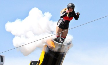 Jennifer Schneider is one of the few female canon balls in the world, and she performed at the Bell Adrenaline Ranch at the Calgary Stampede in Calgary, on July 3, 2015. (Christina Ryan/Calgary Herald)