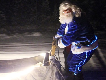 WestJet's Blue Santa took a side excursion to do a little dog sledding in Yellowknife.