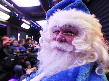 WestJet's Blue Santa sat in a party bus limo after he made the final mini miracle WestJet Christmas stop at the Ronald House British Columbia in Vancouver on Dec. 9, 2015.