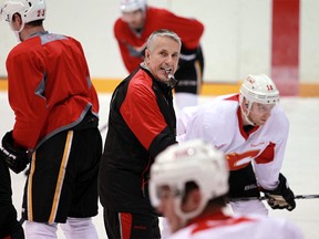 Head coach Bob Hartley runs a drill as the Calgary Flames practised at the Corral on Dec. 14, 2015.