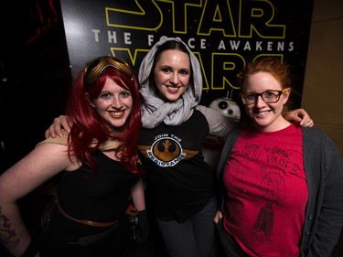 Jenna, left, Ashley, and Amy Shaw show off their Star Wars themed attire on opening weekend at Chinook Cineplex in Calgary on Thursday, Dec. 17, 2015.