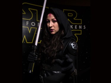 Dara Defreitas poses in her Sith costume at the Star Wars opening weekend at Chinook Cineplex in Calgary on Thursday, Dec. 17, 2015.