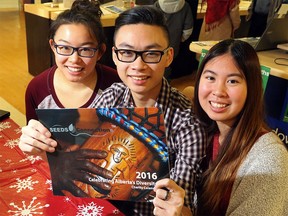 Jessica Ang, 17, Chris Hoang, 16, and Michelle Vuong, 15, are selling their 2016 Celebrating Alberta's Diversity Charity Calendars for $10 at Staples stores and other locations, with all the profits going to their Be the Change project in Calgary.