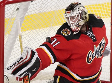 Calgary Flames goalie Karri Ramo makes a save during their game against the Winnipeg Jets  at the Scotiabank Saddledome in Calgary on December 22, 2015.