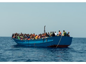 A boat filled with migrants crossing the Mediterranean in August, 2015. Photo courtesy Doctors Without Borders.