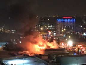 A fire tears through a business in the 9600 block of Macleod Trail the evening of Thursday, December 24, 2015, in Calgary.