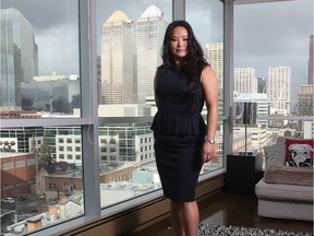 Realtor Christina Hagerty at one of her listings earlier this year, a unit overlooking downtown, in the Colours building in Victoria Park.