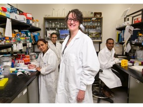 Sharmin Chowdhury, left, Ainna Randhawa, Dr. Carrie Shemanko, and Sesha Gopal Gopinathan pose in the Shemanko lab at the University of Calgary in Calgary on Tuesday, Dec. 1, 2015.