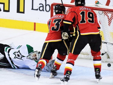 The Calgary Flames' Johnny Gaudreau scores on the Dallas Stars' Antti Niemi in NHL action on Tuesday December 1, 2015.