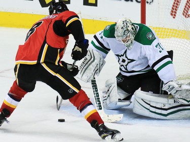 The Calgary Flames' Joe Colborne scores during the shoot out on the Dallas Stars' Antti Niemi. The Flames defeated Dallas 4-3 on Tuesday December 1, 2015.