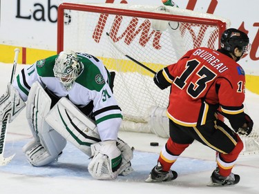 The Calgary Flames' Johnny Gaudreau scores during the shoot out on the Dallas Stars' Antti Niemi. The Flames defeated Dallas 4-3 on Tuesday December 1, 2015.