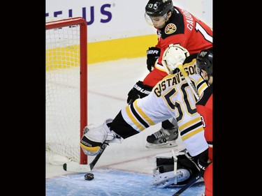 The Calgary Flames' Johnny Gaudreau scores his second of the night against the Boston Bruins' Jonas Gustavsson during the second period of NHL action at the Scotiabank Saddledome on Friday December 4, 2015.