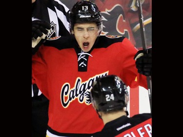 The Calgary Flames' Johnny Gaudreau celebrates after scoring his second of the night against the Boston Bruins' Jonas Gustavsson during the second period of NHL action at the Scotiabank Saddledome on Friday December 4, 2015.