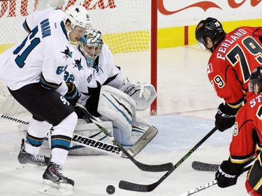 Calgary Flames forward Michael Ferland has a scoring chance on the the San Jose Sharks' Alex Stalock during the third period of NHL action at the Scotiabank Saddledome on Tuesday December 8, 2015.