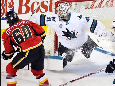 The Calgary Flames' Markus Granlund scores on San Jose Sharks goaltender Martin Jones during the first period of NHL action at the Scotiabank Saddledome on Tuesday December 8, 2015.