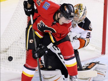 The Calgary Flames' Micheal Ferland wasn't quite able to get this shot  past Anaheim Ducks goaltender John Gibson during NHL action at the Scotiabank Saddledome on Tuesday November 29, 2015.