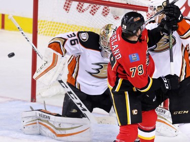 The Calgary Flames try to score on Anaheim Ducks goalie John Gibson during the final minutes of NHL action at the Scotiabank Saddledome on Tuesday November 29, 2015. The Ducks won the game 1- 0.