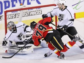 Calgary Flames winger Micheal Ferland looks flies past the Los Angeles Kings' Jonathan Quick during NHL action at the Scotiabank Saddledome on New Year's Eve December 31, 2015.