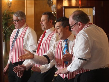 The Vocal Vortex barbershop quartet entertain holiday season visitors to Lougheed House with Christmas songs Saturday December 19, 2015. Carolling from the left are Murray Young, David Kampel, Darcy Allen and John Simpson.