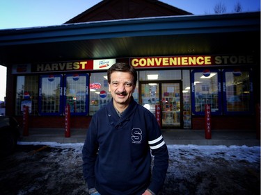 Nadir Bana outside his Harvest Convenience Store in Calgary.