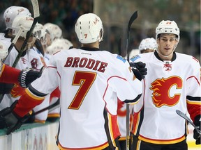 Sean Monahan of the Calgary Flames celebrates a goal with T.J. Brodie in the first period against the Dallas Stars on Thursday. Calgary won its seventh-straight.