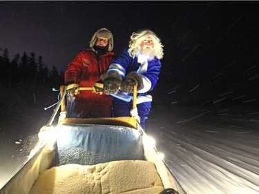 WestJet's Blue Santa took a side excursion to do a little dog sledding with Becks Kennels employee Kaylee Youngdahl in Yellowknife, NT on December 9, 2015 prior to making a special present drop off of new toys, food, treats, beds and toys for the dogs at Beck's Sled Dog Kennels & Tours. WestJet's Blue Santa made his way across the country for WestJets Mini Miracle Day. He started the morning in Halifax and finished in Vancouver with stops in Toronto and Yellowknife.