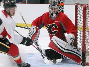 Flames goalie hopeful Jon Gillies turns aside a shot during the team's prospect camp scrimmage last July. The hope is he is fully recovered from hip surgery and ready to participate in next July's development camp.
