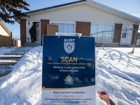 ALERTs Safer Communities and Neighbourhoods (SCAN) team closes down a problem house in the community of Penbroke Meadows in Calgary on Tuesday, Dec. 22, 2015.