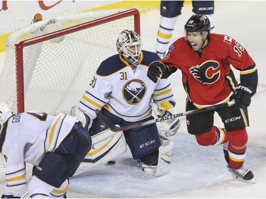 Calgary Flames forward David Jones cheers a third-period tally on Thursday night.