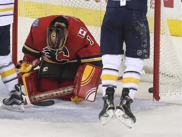 A sad Jonas Hiller after the Buffalo Sabres score at the Saddledome in Calgary, on December 10, 2015.