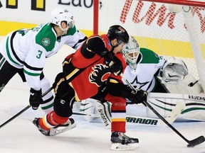 Calgary Flames centre Sam Bennett stretches for a shot on Dallas Stars goaltender Antti Niemi on Tuesday.