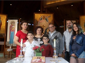 The Khazaka family will be celebrating Christmas together in Calgary. Dania Farah, left back row, Laila Zidan, George Khazaka and Elias Khazaka, George Khazaka, left bottom row, Nawar  Filla, and Julie Khazaka at the St. Stephen Ukrainian Church.