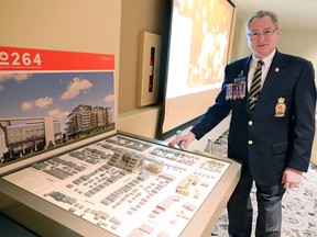 Mark Barham with the Kensington Legion with a model of the redevelopment of the property.