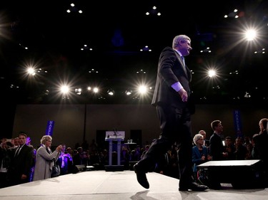 Prime Minister Stephen Harper leaves the stage after  his speech to the crowd at the Conservative HQ in Calgary on October 19, 2015 after losing the Federal Election .