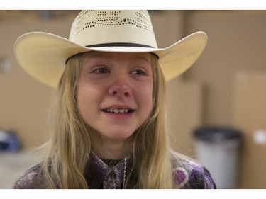 Jenna Whetstone, 11, is so excited she tears up at the meet and greet with the cast of CBC's hit TV show, Heartland, including Jessica Steen (Lisa Stillman), Alisha Newton (Georgie), Shaun Johnston (Jack Bartlett), Graham Wardle (Ty Borden), Amber Marshall (Amy Fleming), and Michelle Morgan (Lou Fleming) in support of HomeFront's 'Cool It, Calgary' campaign at the Symons Valley Ranch market in Calgary, on December 12, 2015.