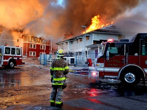 Crews attend a fire at the Medicine Tree Manor seniors' residence in High River on Dec. 15.