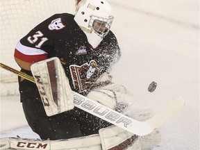 Calgary Hitmen goalie Cody Porter seen making a save last month at the Saddledome, came up big in Medicine Hat on Friday night, leading the local WHL squad to a 2-0 triumph.