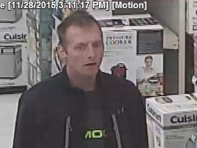 Airdrie RCMP released this surveillance camera image of a man who tried to steal a Roomba vacuum and other items from the London Drug store in Airdrie.