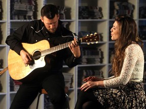 Maddison Krebs performs with guitarist Carl Janzen at the Calgary Herald.