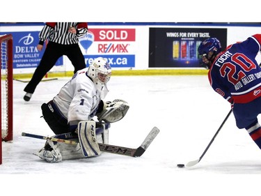 Pats Carson Focht lines up his shot on Royals goalie Austin Roden as the Regina Pat Canadiens played the South Island Royals at the Mac's AAA Midget Hockey tournament on December 27, 2015 at the Max Bell arena.