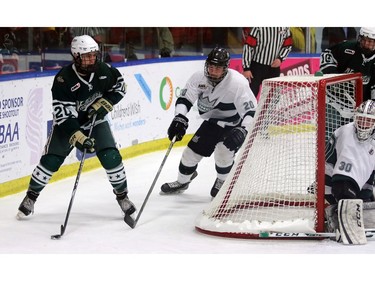 Northstars Eric Lemire, 20, looks for a pass as Kings Nicholas Mantal, 20, tries to catch up and goalie Luke Lush watches out of the corner of his net as the Calgary Northstars played the Sherwood Park Kings at the Max Bell Centre arena one on December 28, 2015.