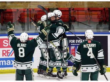 Northstars Connor Blake, 8; Tyler McCarry, 4; Eric Lemire, 20; Tyler Lowe, 7, and David Lenzin, 12, celebrate their first goal of the game as the Calgary Northstars played the Sherwood Park Kings at the Max Bell Centre arena one on December 28, 2015.