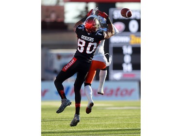 Stamps Eric Rogers gets tangled up with Lions T.J.  Lee and the ball feel to the ground in the first half. during the West Division semifinal on November 15, 2015 at McMahon Stadium.