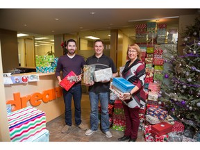 Michael Tandara, Ryan Armstrong and Pat Lothrop at Dream's Calgary office.