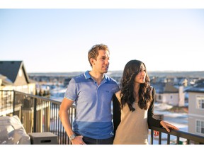 Jevon Almond and Shaila Zaver on the balcony of their Mosaic Riverstone home.