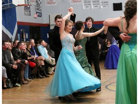 Sean DeVisser spins his partner Erin McRae, who later earned the title of Queen, at the Queen's Ball in Nanton on December 4, 2015.