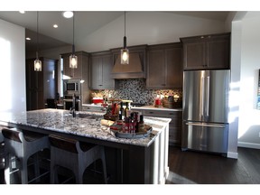 A view of the kitchen in the Rundle Homes by Avi show home in Harmony.